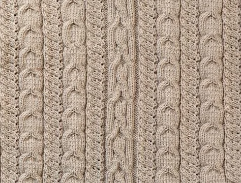 Knit pattern. Knitted wool texture. Stock Photos