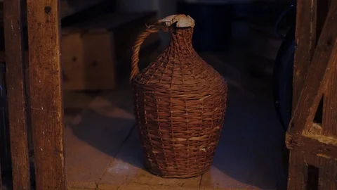 Knit pitcher in dark and shadow surroundings. Stock Footage 121475229