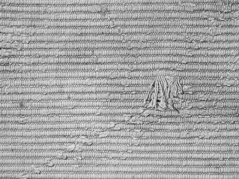Knit rough fabric texture. Stock Photos