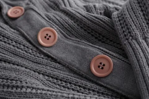Knit sweater closeup button Stock Photos