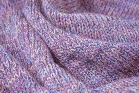 Knit texture of natural soft wool knitted fabric pink pastel melange backgrou Stock Photos