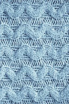 Knit texture of natural soft wool knitted fabric light blue background Stock Photos