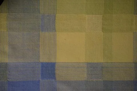 Knit wool plaid background pattern. Traditional warm checkered handmade stitch Stock Photos