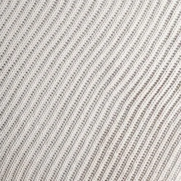 Knitted background.Texture of rough knitting from white diagonal woolen threa Stock Photos