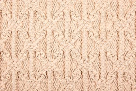 Knitted beige background Stock Photos