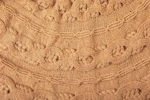 Knitted beige background Stock Photos