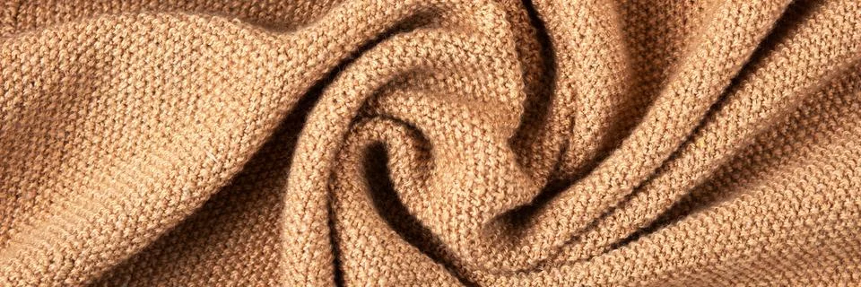 Knitted beige background Stock Photos