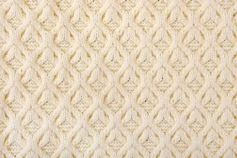 Knitted beige background Stock Photos