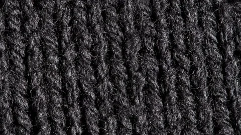Knitted black fabric Stock Footage 166859356