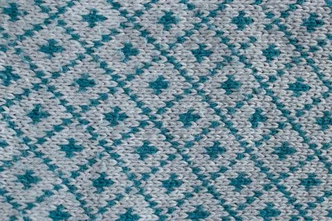 Knitted blouse, with diamond shape pattern . abstract backdrop, close up te.. Stock Photos