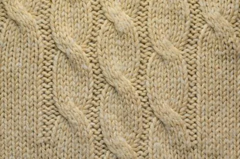 Knitted Cloth Texture with Cable Knits Pattern Stock Photos