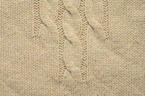 Knitted Cloth Texture with Cable Knits Pattern Stock Photos