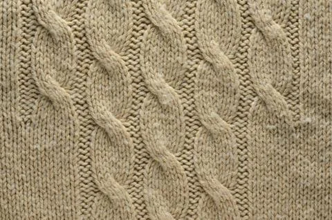 Knitted Cloth Texture with Cable Knits Pattern Stock Photos