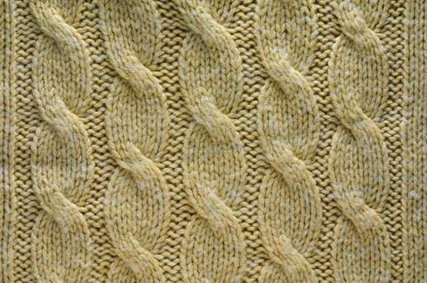 Knitted Cloth Texture with Cable Knits Pattern Stock Photos