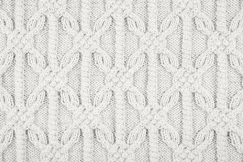 Knitted cloud dancer color background Stock Photos