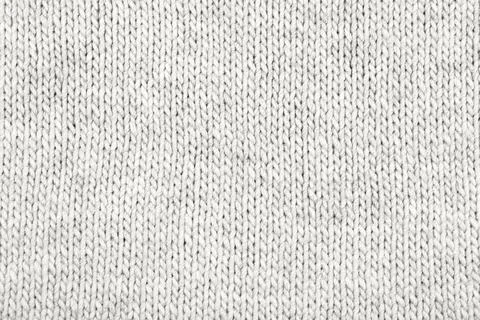 Knitted cloud dancer color background Stock Photos