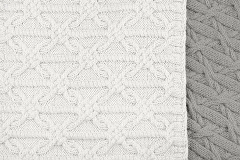 Knitted cloud dancer color background Foto stock