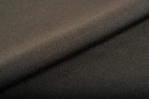 Knitted elastic fabric, weaving of threads texture, crumpled fold Stock Photos