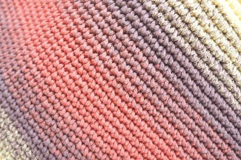 Knitted fabric with gradient color pattern in close-up view Foto stock