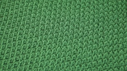 Knitted fabric of green threads background, texture Video stock 224145598