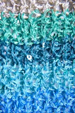 Knitted fabric pattern Stock Photos