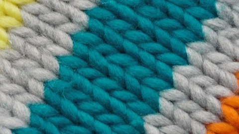 Knitted fabric threads macro Stock-Footage 125948627