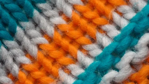 Knitted fabric threads macro looped footage Stock Footage 125948530