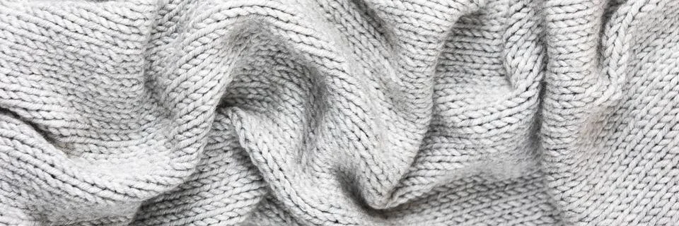 Knitted gray background Stock Photos