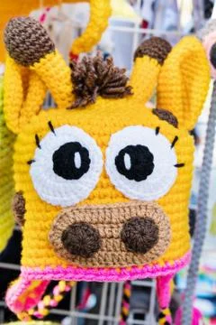 Knitted hat in the storefront Stock Photos