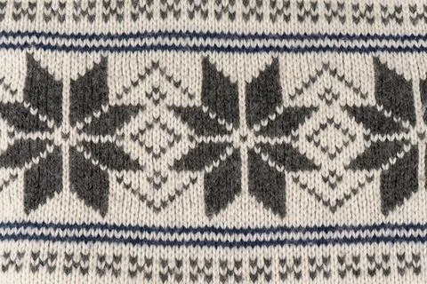 A knitted item with a pattern of squares and triangles 写真素材