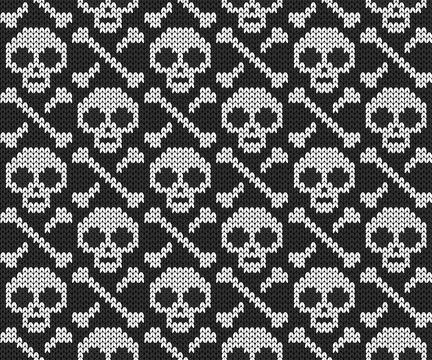 Knitted jacquard seamless pattern with skull and bones. Illustrazione stock