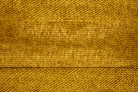 Knitted jersey background with a relief pattern Stock Photos