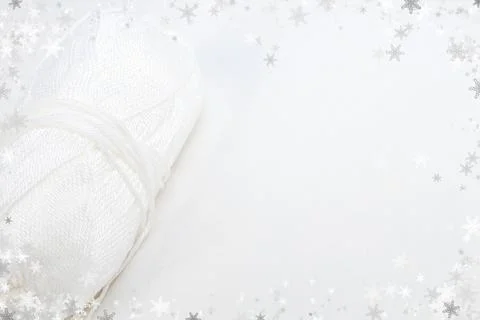Knitted jersey background with a relief pattern, winter, snow, snowflakes. .. Stock Photos