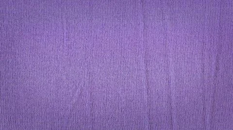Knitted lilac texture surface close up. Background from softness lilac blanke Stock Photos