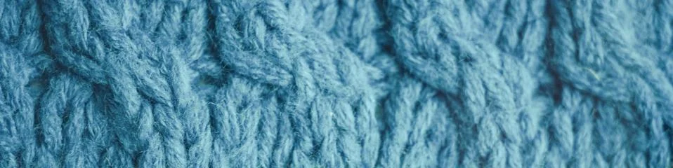 Knitted pattern of threads in blue color Foto stock