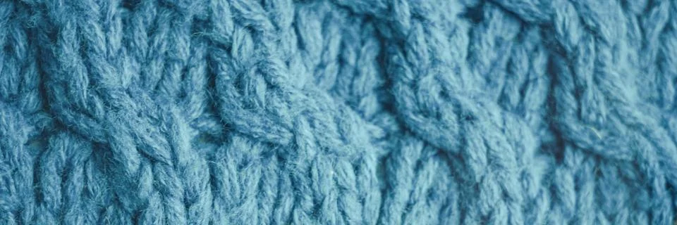 Knitted pattern of threads in pale blue color 写真素材