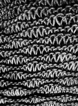 Knitted pattern of wool or acrilyc yarn. Lush machine or hand knitting. Warm  Stock Photos