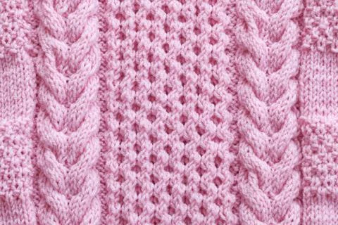 Knitted pattern from wool Stock Photos