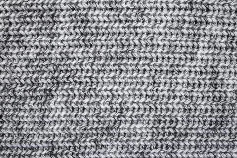 Knitted pullover fabric , soft wool thread pattern, vertical rows Foto stock