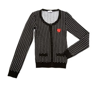 Knitted pullover with hearts Stock Photos