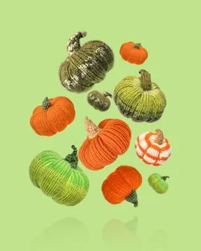 Knitted pumpkins Stock Photos