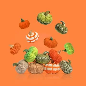 Knitted pumpkins Stock Photos