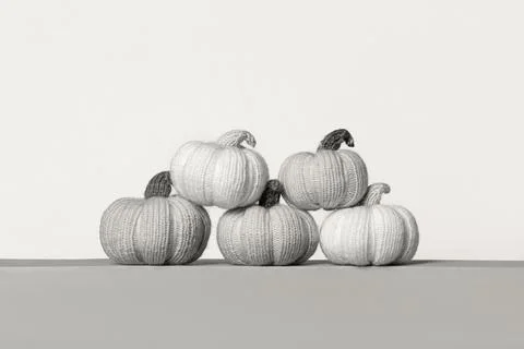 Knitted pumpkins Stock Photos