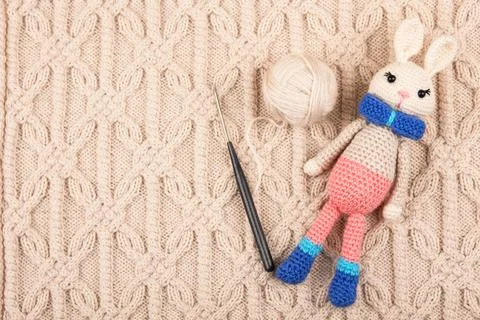 Knitted rabbit toy Stock Photos