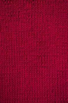 Knitted red canvas pattern Stock Photos