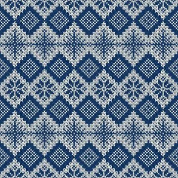 Knitted scandinavian pattern with snowflakes. Vector. 库存插图