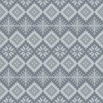 Knitted scandinavian pattern with snowflakes. Vector. Stock Illustration