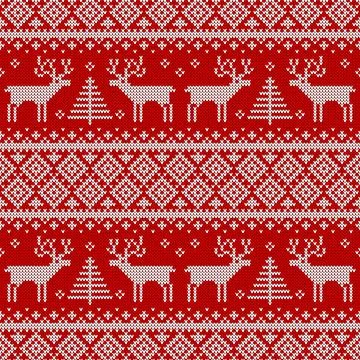 Knitted seamless pattern with deers and Christmas trees. 스톡 일러스트