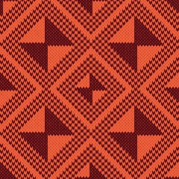 Knitted Seamless Pattern in orange and brown hues Illustrazione stock