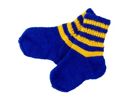 Knitted socks for the kid. Stock Photos